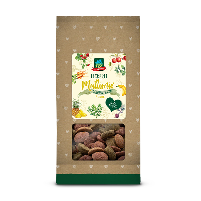 LEXA Multimix in einer grün braunen Verpackung (1kg Beutel) mit Herzchenmuster, einem Etikett und einen Sichtfenster, durch welches das Produkt angesehen werden kann.